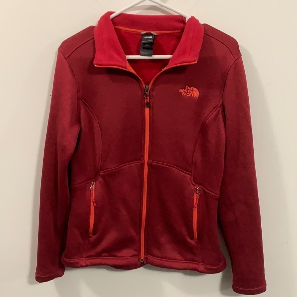 Red North Face jacket with orange details, good condition, size S/P